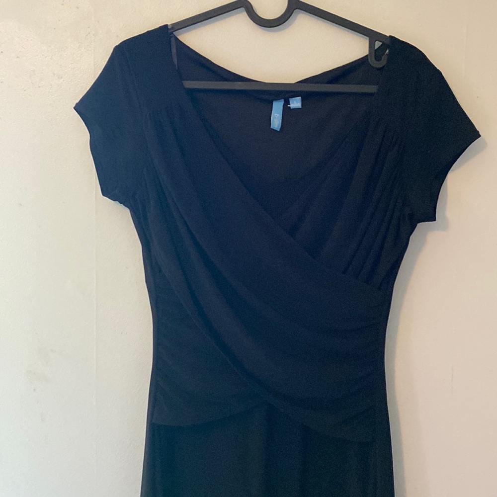 Gently worn sexy slim cocktail dress. Curve hugging and form fitting.